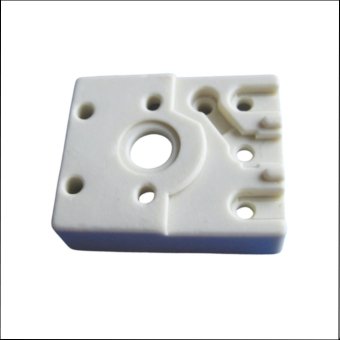Ceramic thermostat insulator housing