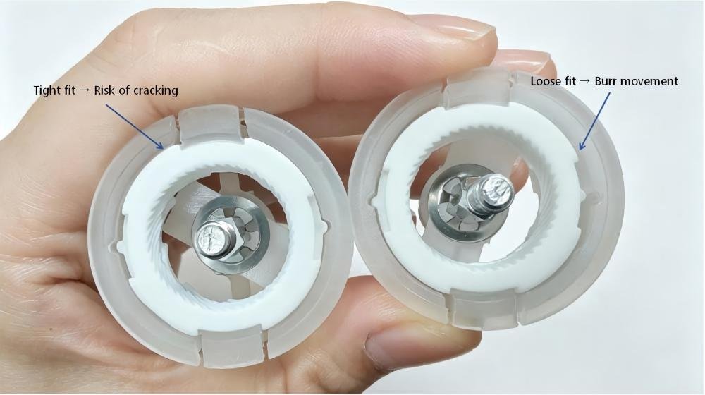 Tight and loose fit between ceramic burr and assembly parts