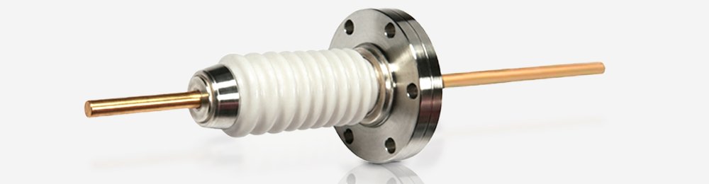 Ceramic-to-metal vacuum feedthrough assembly with alumina insulator, metal flange, and copper conductor used in high-vacuum systems
