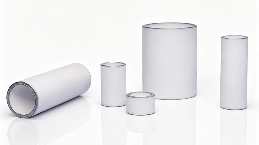 Metallized alumina ceramic tubes used for vacuum feedthroughs and high-voltage insulation components.